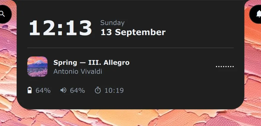 The island opened into a glance under the pointer: the time and the date, the track playing, and the battery, the volume and a running countdown.