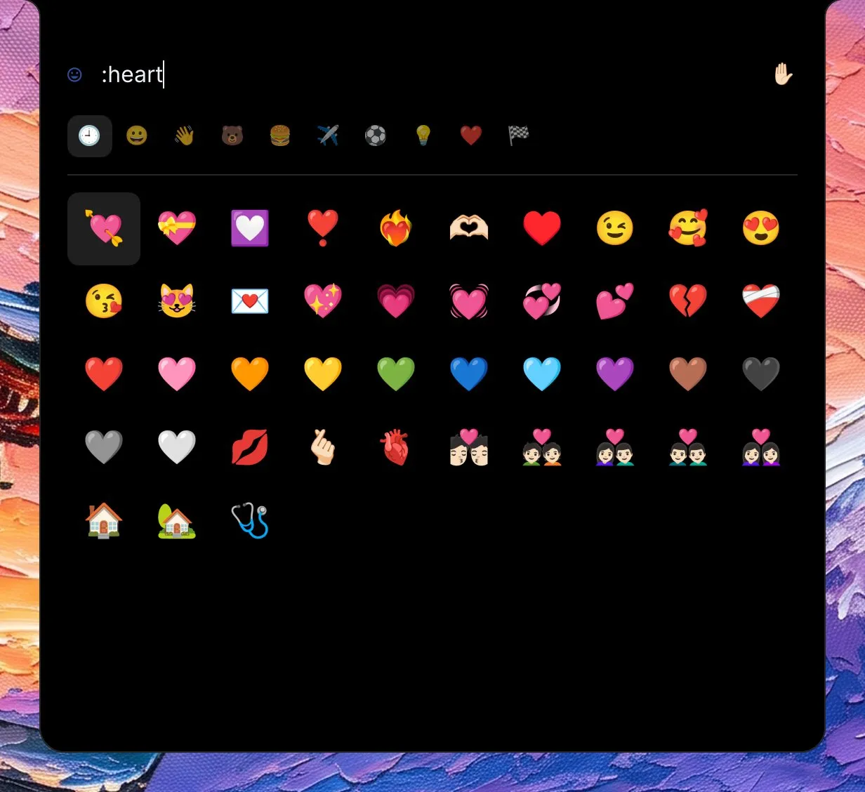 The launcher in emoji mode with :heart typed: a strip of group marks under the field, the recent picks chosen, and a grid of hearts, faces with hearts, a love letter and couples with a heart, with a raised hand at the end of the field for the skin tone.