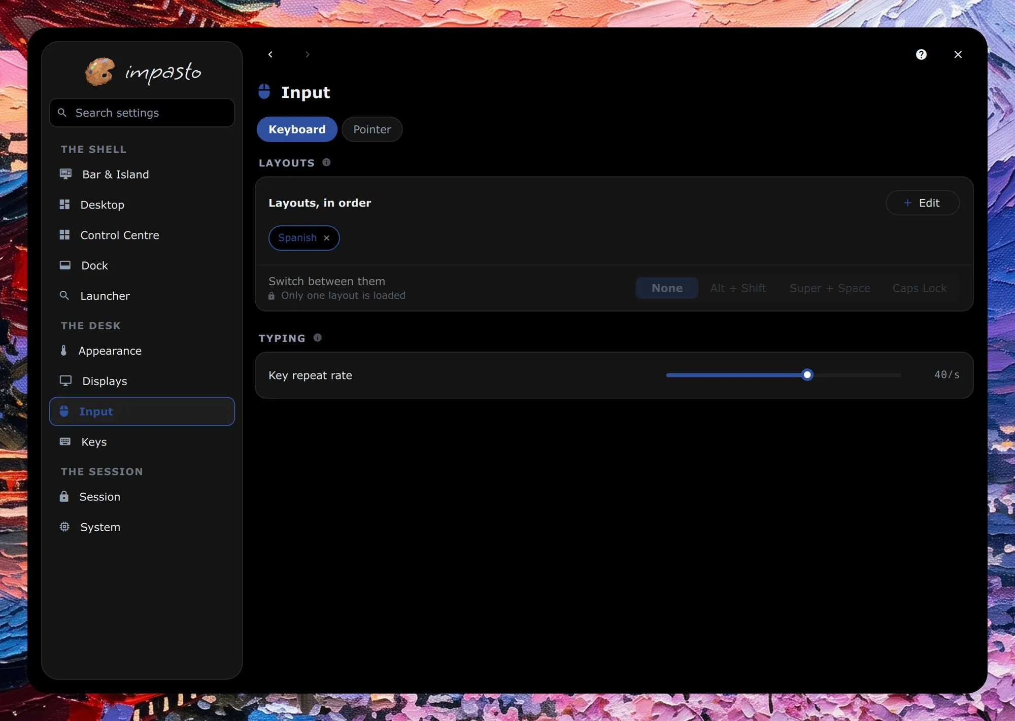 The settings window on the Input page, with the sidebar on the left; the page shows the keyboard layouts, how to switch between them and the key repeat rate.