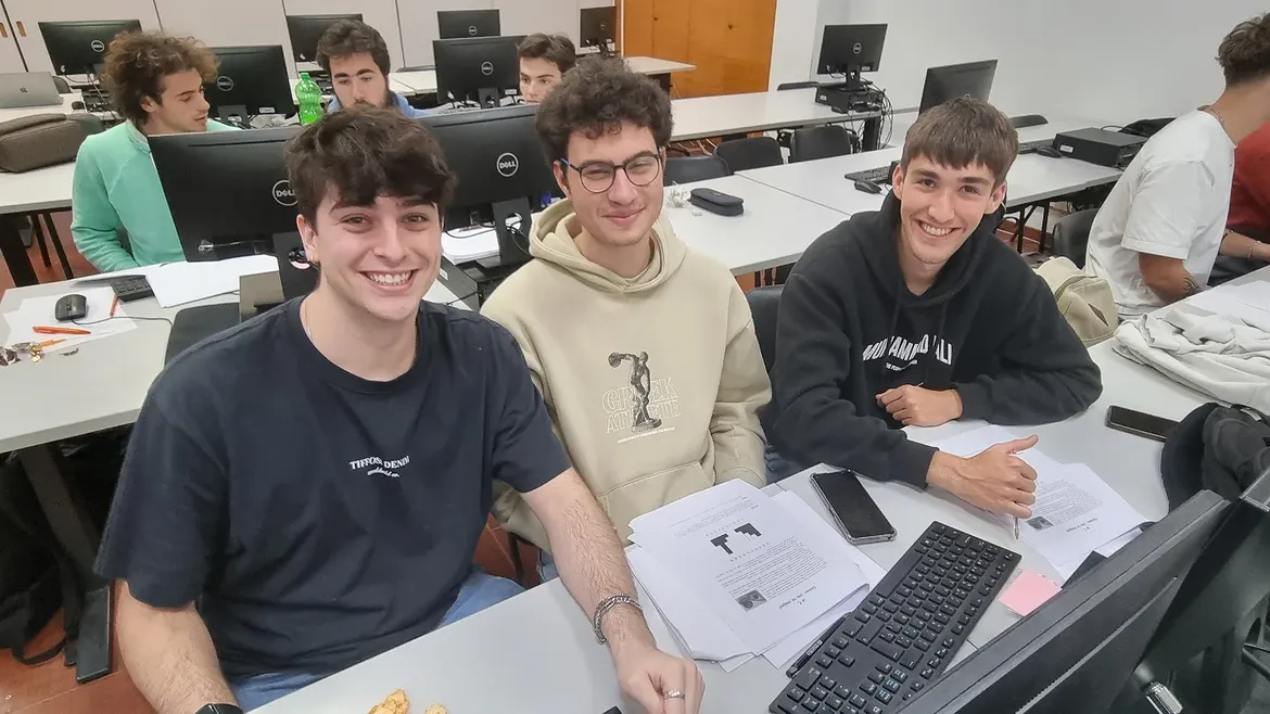 The three of us at our machine in the lab during the contest